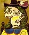 Head of a woman with a purple hat 1939 Pablo Picasso